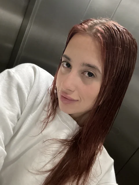 Natalye in a cream sweater